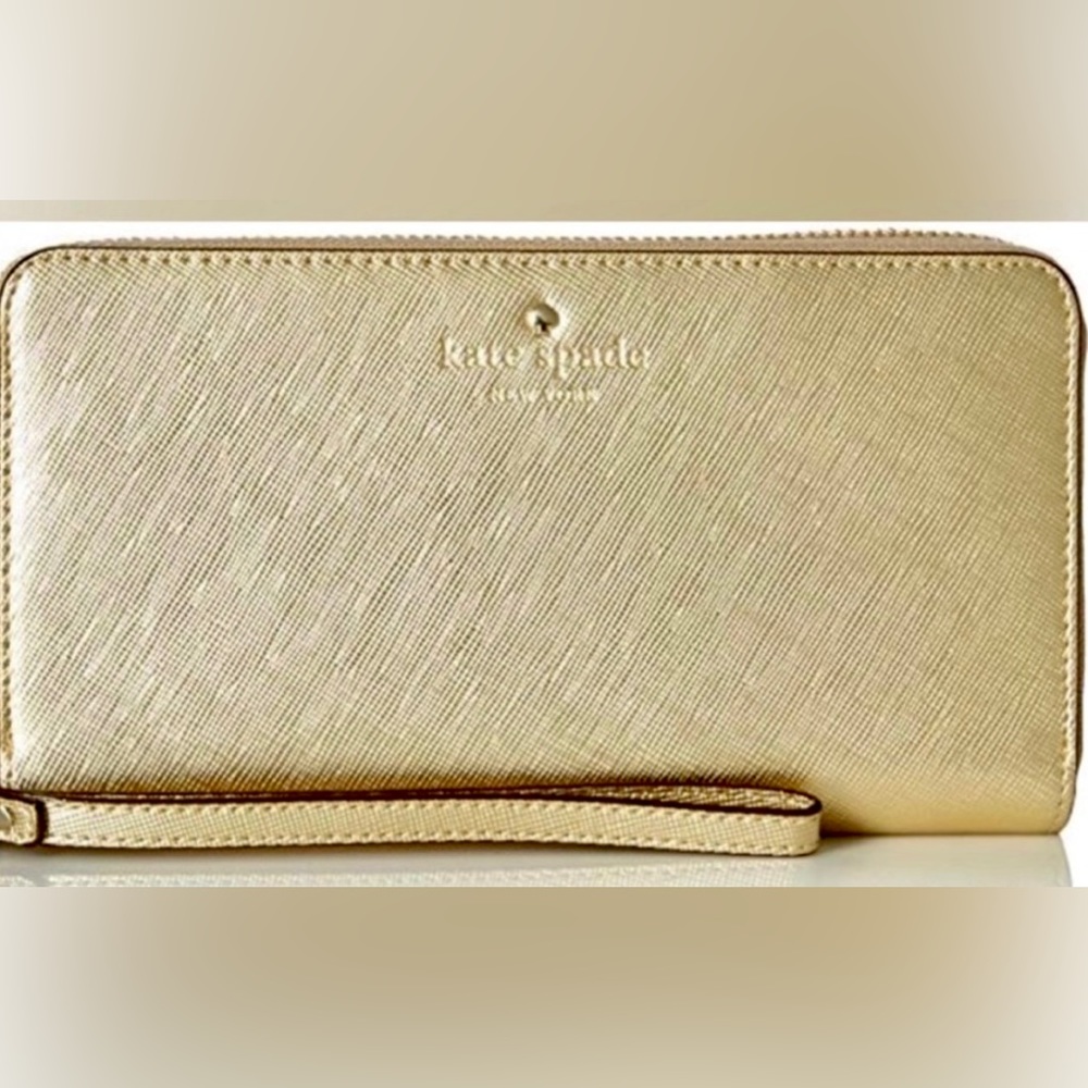 Kate Spade Talk Is Chic Gold Leather
Wristlet Wallet with Zipper great condition